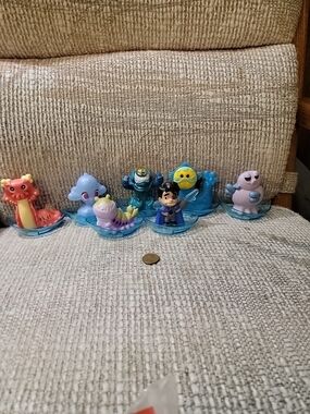 DISNEY PIXAR ELO COLLECTORS TOYS. ALL SEVEN. NEW ALL SALES AEE FINAL